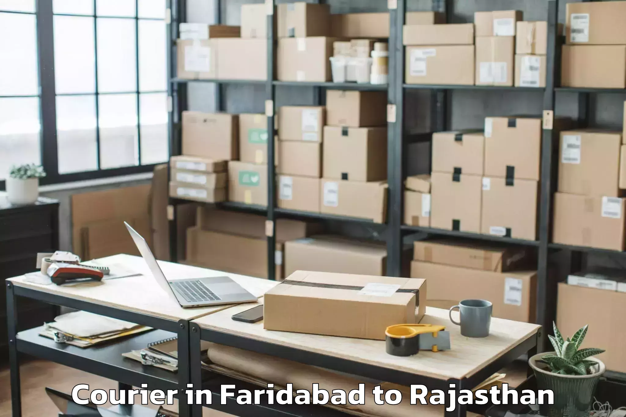 Book Your Faridabad to Bilara Courier Today